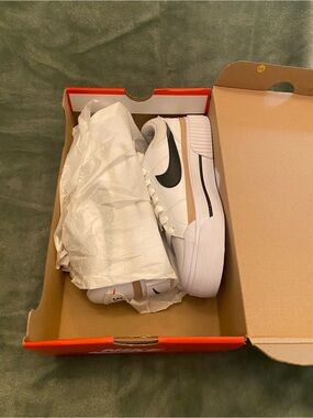 Nike Women's Court Legacy Lift shoes in white, black, and desert ochre.